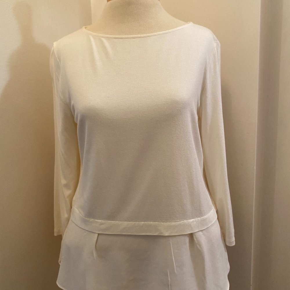 Ann Taylor medium petite cream 2-fabric top with a slight peplum banded bottom